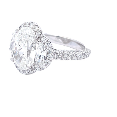 Platinum 4.07 CT Diamond Oval Center, 2/3 Half Moon Side Diamonds, and 1.06 CTW Round Pave Set Diamond Mount Engagement Ring