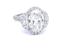 Platinum 4.07 CT Diamond Oval Center, 2/3 Half Moon Side Diamonds, and 1.06 CTW Round Pave Set Diamond Mount Engagement Ring