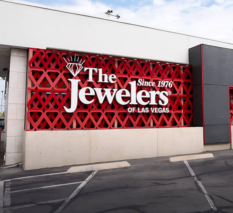The front The Jewelers location. Red facade with white text. {{Flagship Location - Western Avenue}}